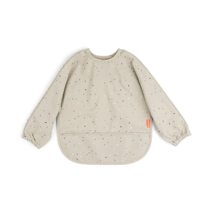 Done by Deer Sleeved pocket bib Confetti Sand